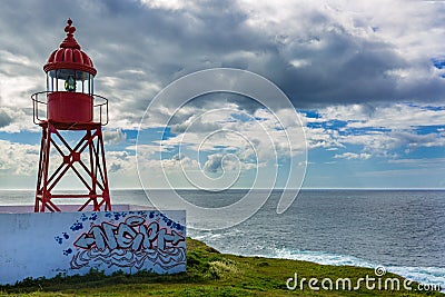 Small lighthouse near the port of Ponta Delgada Editorial Stock Photo