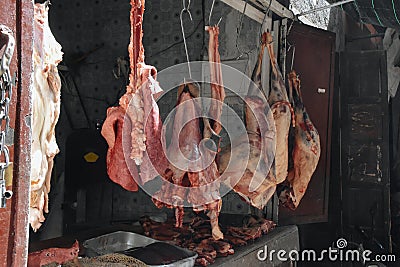 A small local butcher shop near Marekesh, Morocco. Editorial Stock Photo