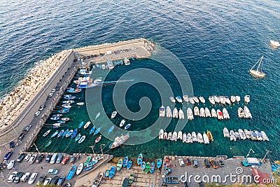 Small mediterranean port with docked boats, aerial view Stock Photo