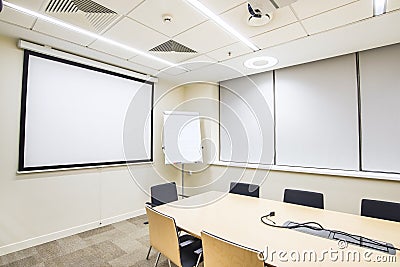 Small meeting or training room with TV projector Stock Photo