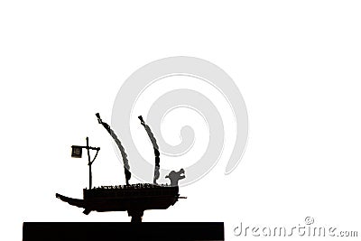 A model of famous ancient Korean ironclad war ship. Korean turtle ship on a white background. Black and white silhouette Stock Photo