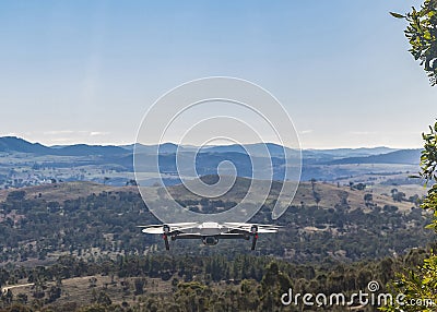 A small modern unmanned aerial vehicle drone Stock Photo