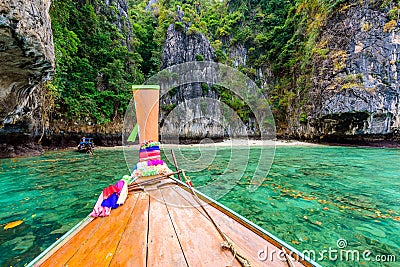 The small Monkey beach in paradise Bay - about 5 minutes boat ride from the Ao Ton Sai Pier - Koh Phi Phi Don Island at Krabi, Stock Photo