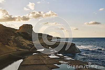 A small mountain near the small pools Stock Photo