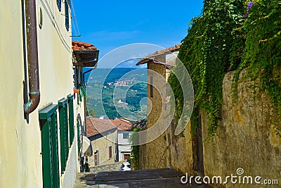 Small, narrow and colored street in Fiesole, Italy Editorial Stock Photo