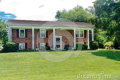 Small nice brick house with columns in a village near the atlantic ocean Editorial Stock Photo