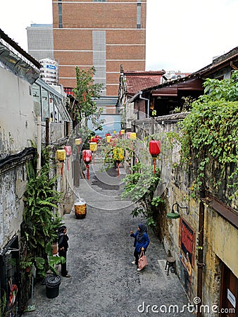 Small off the beaten path alley in Chinatown Kuala Lumpur with colorful lanterns. Editorial Stock Photo