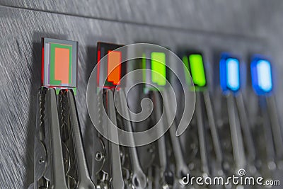 Small oled displays is lighting on a probe station. Lighting display technology. Stock Photo