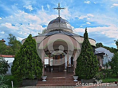 Small open chapel and decorative plants at Serbian Monastery Stock Photo