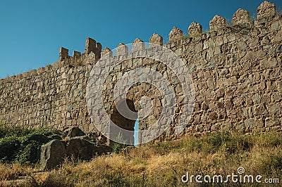Small open gateway on a stone wall at Avila Stock Photo