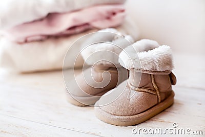 Small pair baby ugg on white background Stock Photo