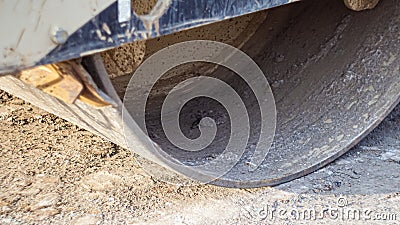 a small part of the construction roller on the road section . Stock Photo