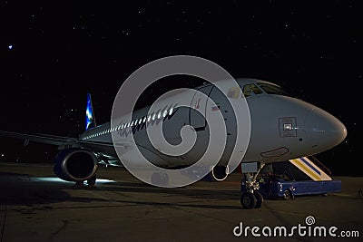 A small passenger plane awaits departure. Editorial Stock Photo