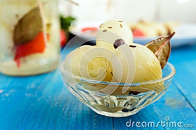 Small Pickled Onion `Pearl` in a transparent bowl Stock Photo