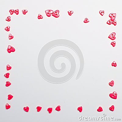 Small pink hearts on the perimeter on a white background Stock Photo