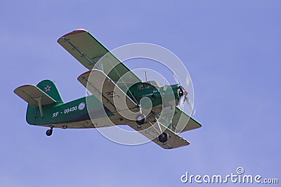 Small plane landing jet Editorial Stock Photo