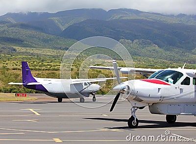 Small planes at exotic airport Stock Photo