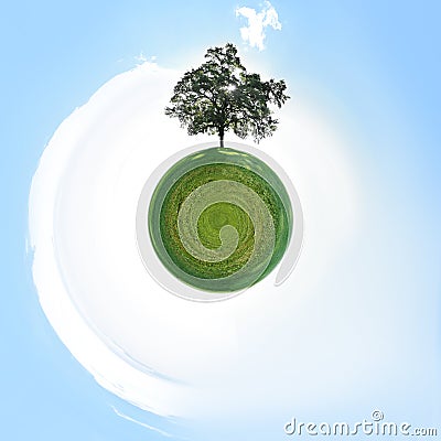 Small Planet with Single Tree Stock Photo