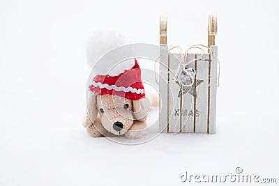 Small plush dog in Santa hat Stock Photo