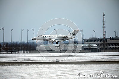 Private plane landing in Munich Airport, MUC Editorial Stock Photo