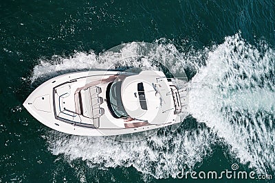 Small private yacht in the sea with beautiful turquoise wave in ocean. Stock Photo