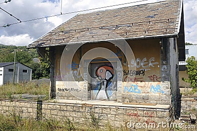 Small railway station building vandalized Stock Photo