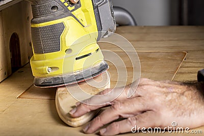 Random Orbital Sander In Use Stock Photo