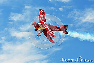 Small red biplane Editorial Stock Photo