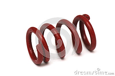 A small red industrial heavy duty spring Stock Photo