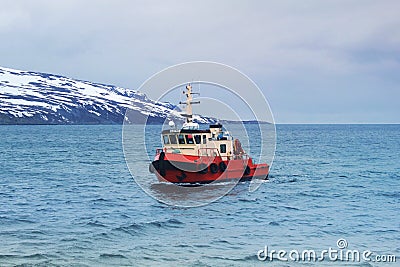 Small red pilot in Norwegian Sea Editorial Stock Photo