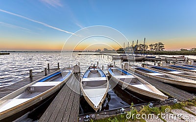 Small rental boats in a marina in summer Stock Photo