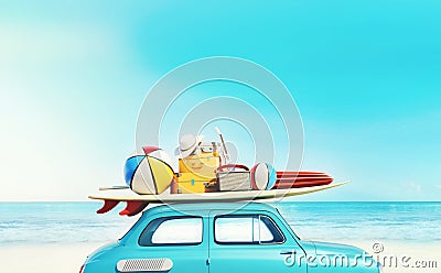 Small retro car with baggage, luggage and beach equipment on the roof, fully packed, ready for summer vacation Stock Photo