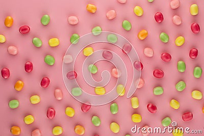 Small round candy-colored pastels on pastel background Stock Photo