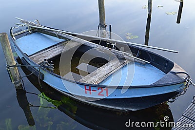 Small rowing boat in water Stock Photo