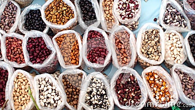 Small sacks of dried beans and grains Stock Photo