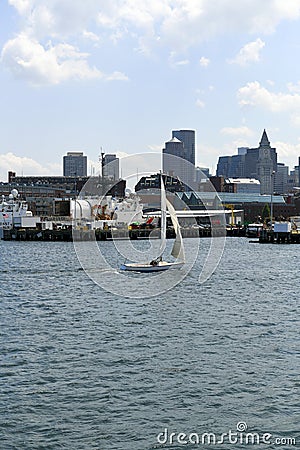 Sailboat passes Coast Guard Editorial Stock Photo
