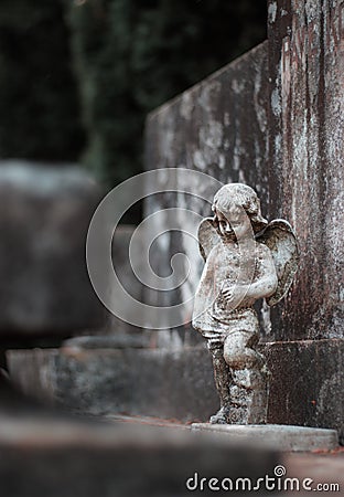 Small sculpture of a baby angel Stock Photo