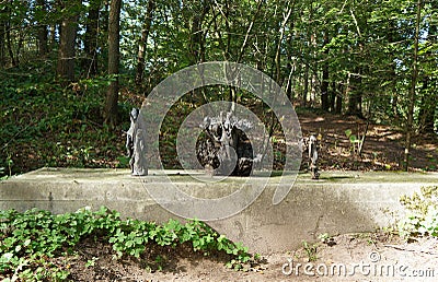 The small sculptures stands in the park Editorial Stock Photo