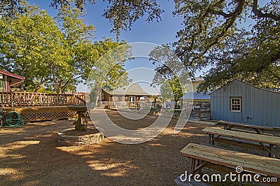 The small shaded square of the Bybee Shopping Village in Round Top. Editorial Stock Photo