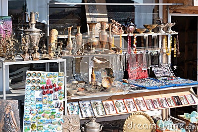 Armenia, Lake Sevan, September 2021. Vintage items on the counter of a local souvenir shop. Editorial Stock Photo