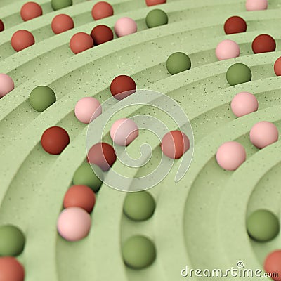 Small spheres rolling down wavy slide Stock Photo