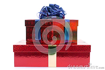 Small stack of red Christmas gift boxes with blue ribbon bow isolated on white background Stock Photo