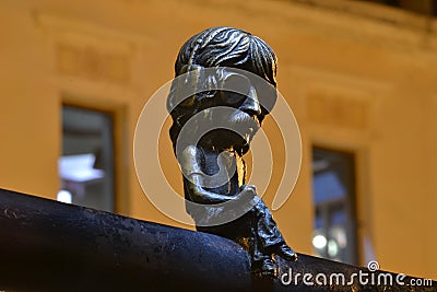 Small statue at night Editorial Stock Photo
