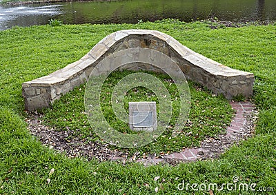 Small stone memorial of Ila Bunk, a dedicated employee of the City of Dallas, located near Turtle Creek. Stock Photo