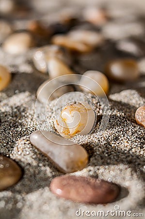 Small stones over sand Stock Photo