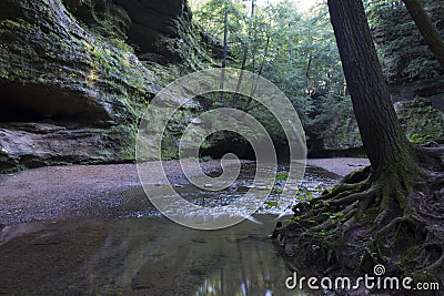 Small stream and cliff Stock Photo