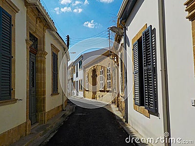 a small street with houses in greece Stock Photo