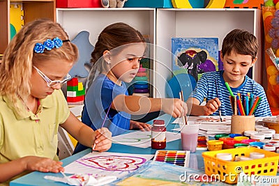 Small students children painting in art school class. Stock Photo