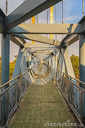 Small suspension steel bridge structure detail. Steel structure Stock Photo