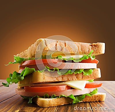 Small toast sandwich on wooden table Stock Photo